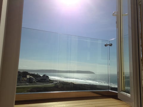 Decked glass balcony