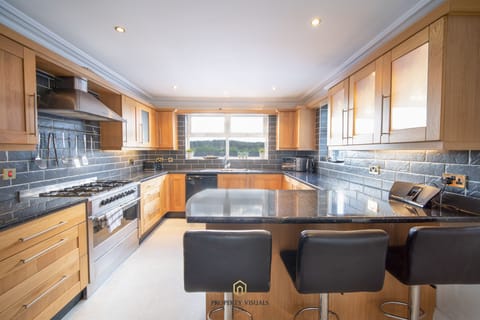 large kitchen with all of the utensils for your stay