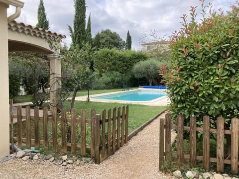 Outdoor pool, a heated pool, sun loungers