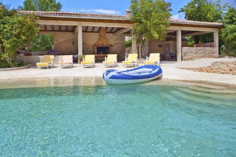 Pool boat, and the sunbathing chairs