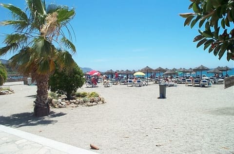 Beach nearby, sun loungers