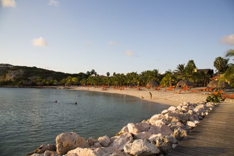 On the beach, sun loungers, beach towels