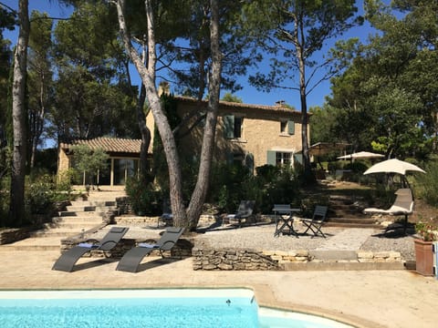 A heated pool, sun loungers