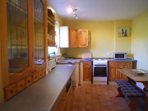 A bright but basic kitchen.