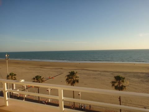 On the beach, sun loungers