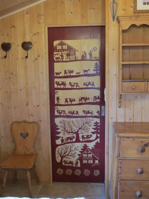 Unique hand-painted door to the en-suite shower room