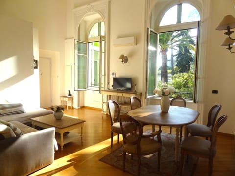 Air-conditioned living/dining room - high ceiling, period features & lovely view