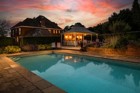 Outdoor pool, a heated pool, sun loungers