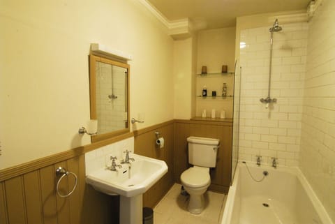 Combined shower/tub, hair dryer, towels, soap