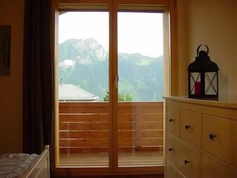 Birch Bedroom with balcony and bathroom View of Le Chamossaire