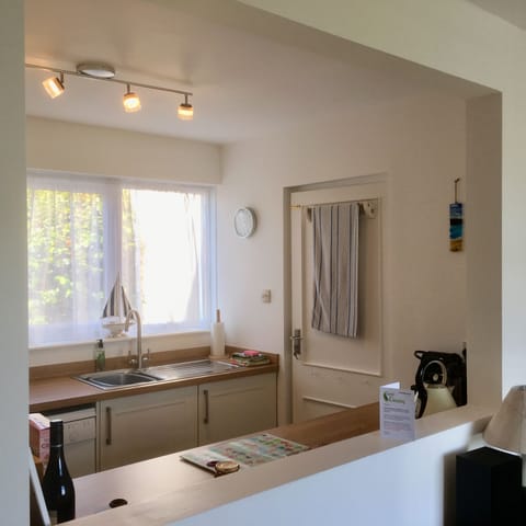 kitchen links with dining room