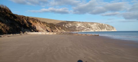 On the beach, sun loungers