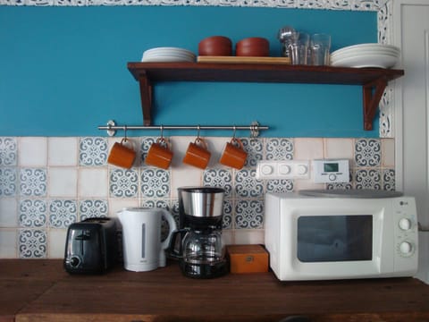 Fridge, coffee/tea maker, electric kettle, toaster