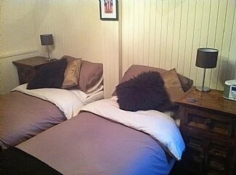 Second bedroom - made up as single beds