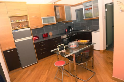 Kitchen view. Coffee machine, kettle, toaster and more...
