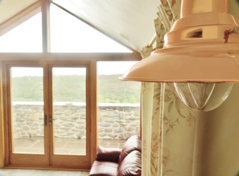 The full size window and patio doors allow you to make the most of the view
