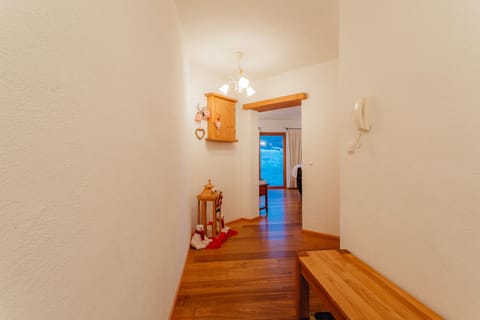 large hallway with storage and area for ski clothing/jackets etc