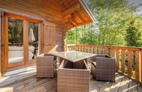Balcony with Table Chairs and BBQ