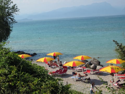 Beach nearby, sun loungers