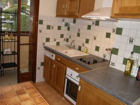 Kitchen with loggia at back for additional space and storage