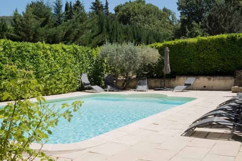 Outdoor pool, a heated pool, sun loungers