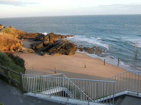 On the beach, sun loungers