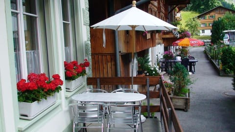 terrase with table to watch waterfall, mountains