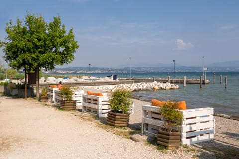 On the beach, sun loungers