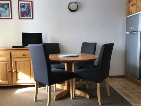 Dining with TV for DVDs. Full size fridge freeze with single oven and 4 ring hob