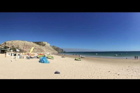 Beach nearby, sun loungers