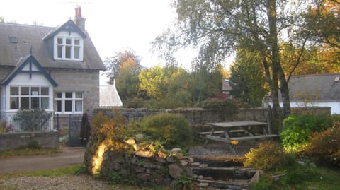 front of house, showing one of  several seating areas