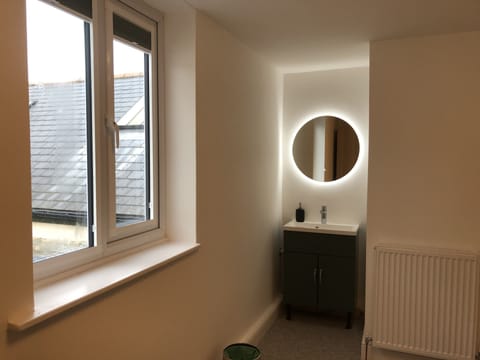Bunk bedroom. Sink with touch mirror lighting.