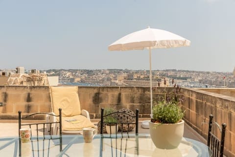 The private terrace with views of Grand Harbour and Fort Saint Angelo
