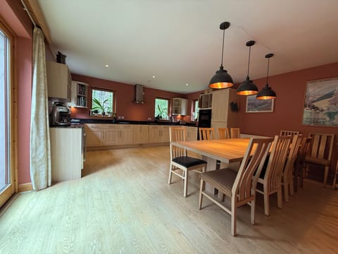 Kitchen with wine fridge and fridge freezer: Utility rm off hall with sml fridge