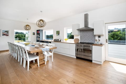 main kitchen with table for up to 20