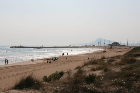 On the beach, sun loungers