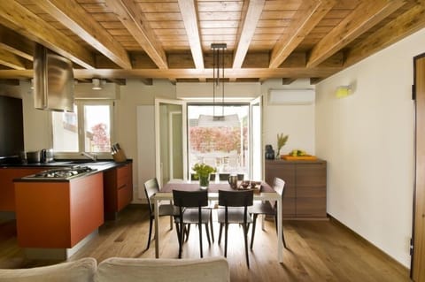 The kitchen diner with feature beam ceiling furnished to the highest standard
