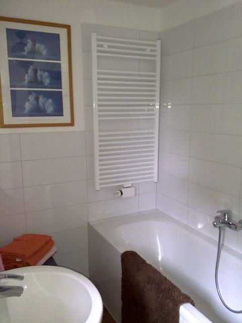 Combined shower/tub, hair dryer, towels, soap