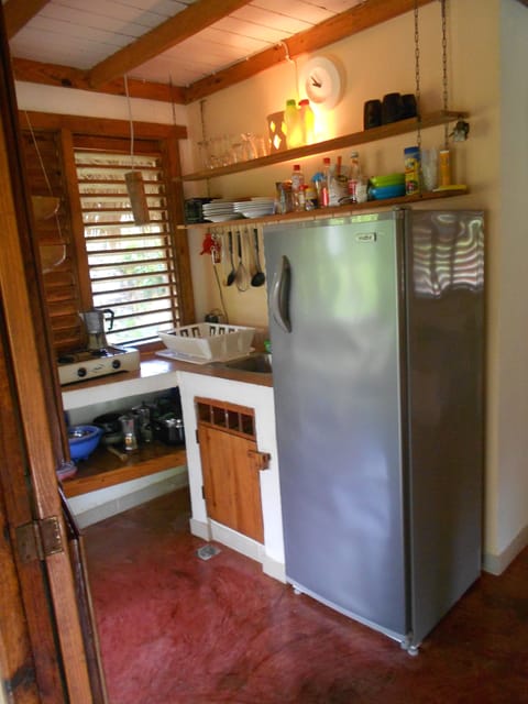 Fridge, stovetop, coffee/tea maker, cookware/dishes/utensils