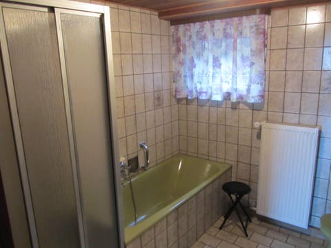 Combined shower/tub, hair dryer, towels, toilet paper