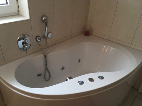 Bathtub, jetted tub, hair dryer, soap