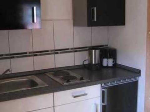 Fridge, microwave, cookware/dishes/utensils