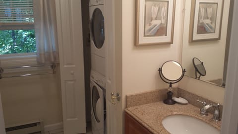 Combined shower/tub, hair dryer, towels, toilet paper