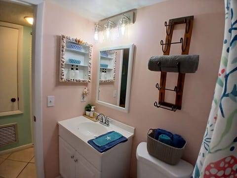 Combined shower/tub, hair dryer, towels, soap