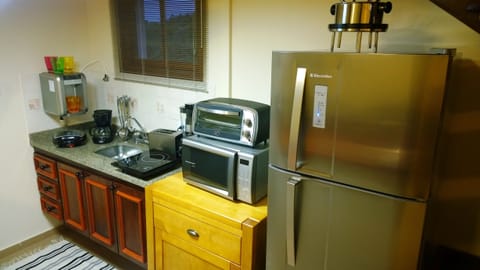 Fridge, microwave, coffee/tea maker, electric kettle