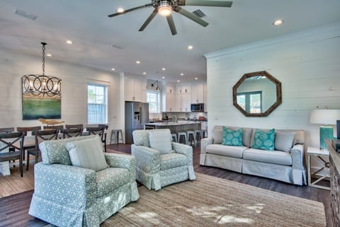 Open Living Room w/ 65 Inch Flat Screen