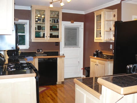 The Kitchen: All new appliances, granite counter tops and custom cabinets.