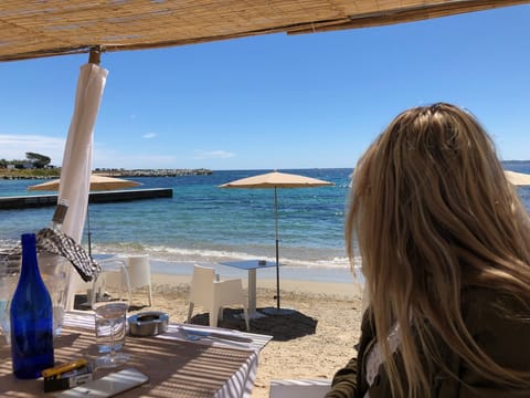 On the beach, sun loungers