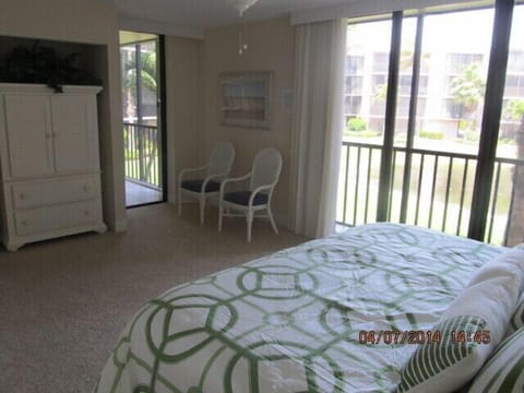 Large master bedroom with wonderful view of pond, green area & access to Linea