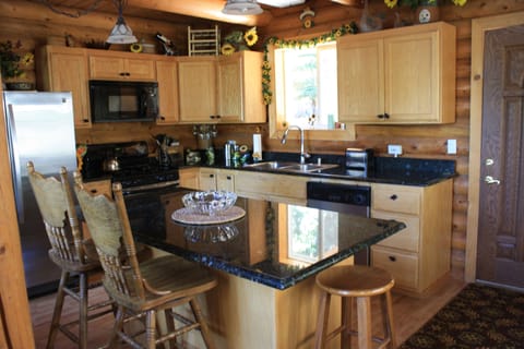 Another view of the kitchen and island